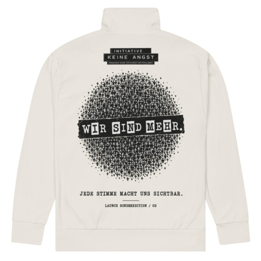 KA Studio Batch P801 – Sonderedition „Wir sind mehr“ – Recycelte Unisex-Trainingsjacke mit Allover-Druck – Rückansicht mit zentriertem Motiv