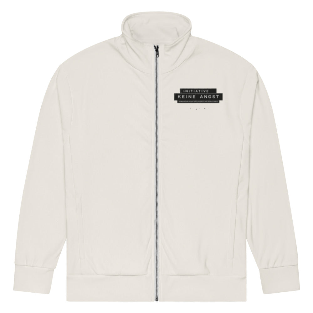 KA Studio Batch P801 – Sonderedition „Wir sind mehr“ – Recycelte Unisex-Trainingsjacke mit Allover-Druck – Vorderansicht mit kleinem Label auf der linken Brust