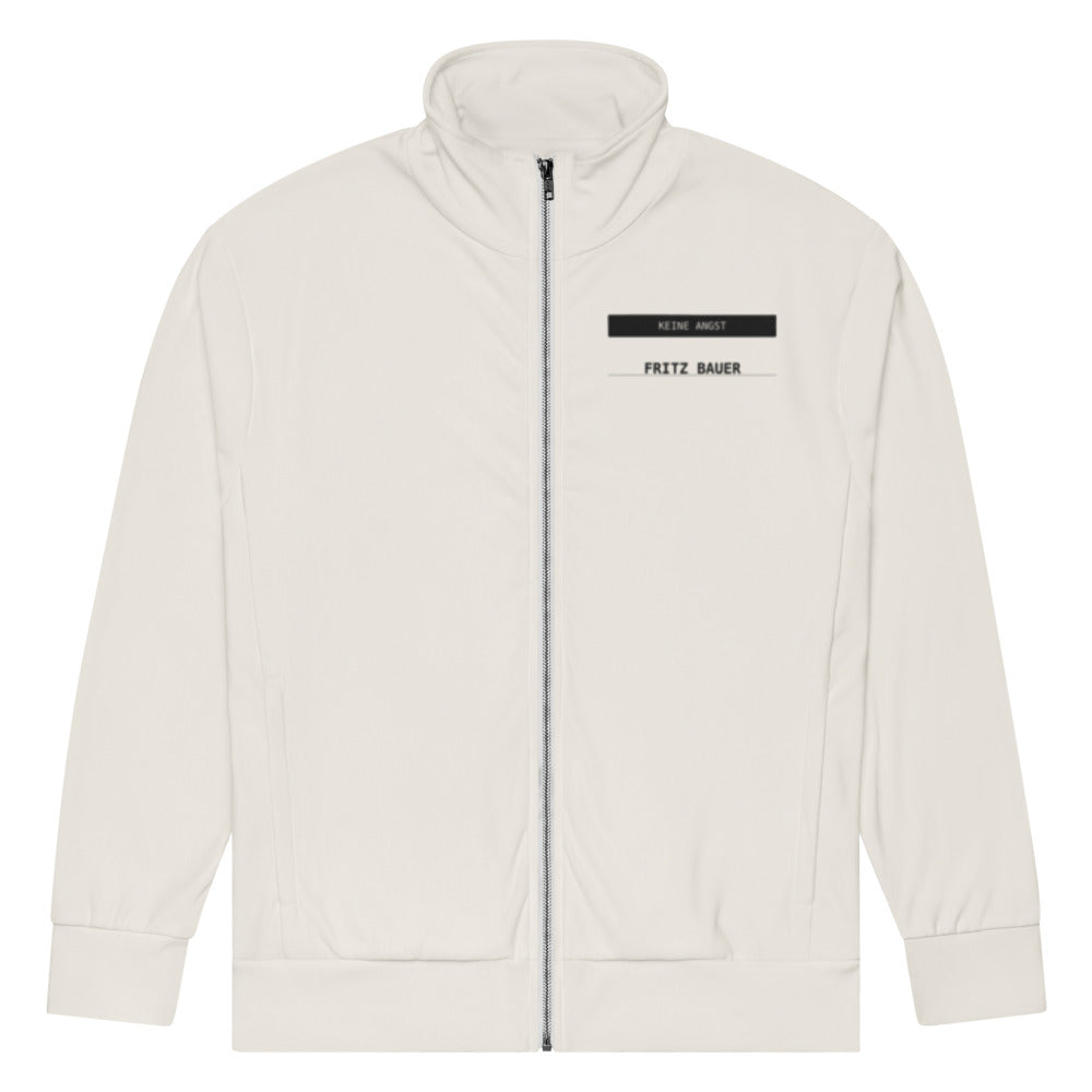 KA Studio Batch P801 – Fritz Bauer – Recycelte Unisex-Trainingsjacke mit Allover-Druck – Vorderansicht mit kleinem Label auf der linken Brust